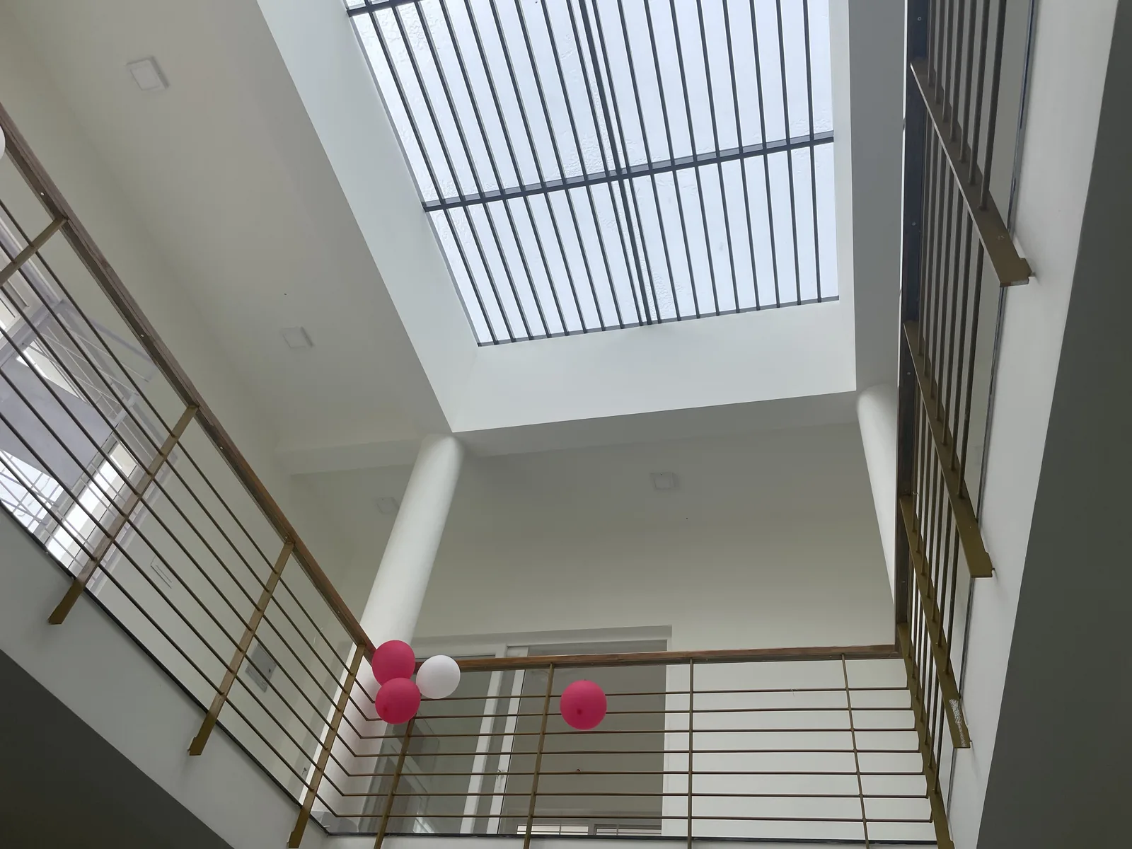 AM Residence — double-height courtyard with skylight, Thirupathoor, Chennai