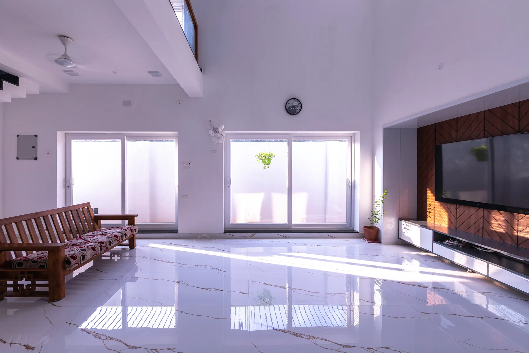 GK Residence — living room with double-height ceiling, Guduvanchery, Chennai