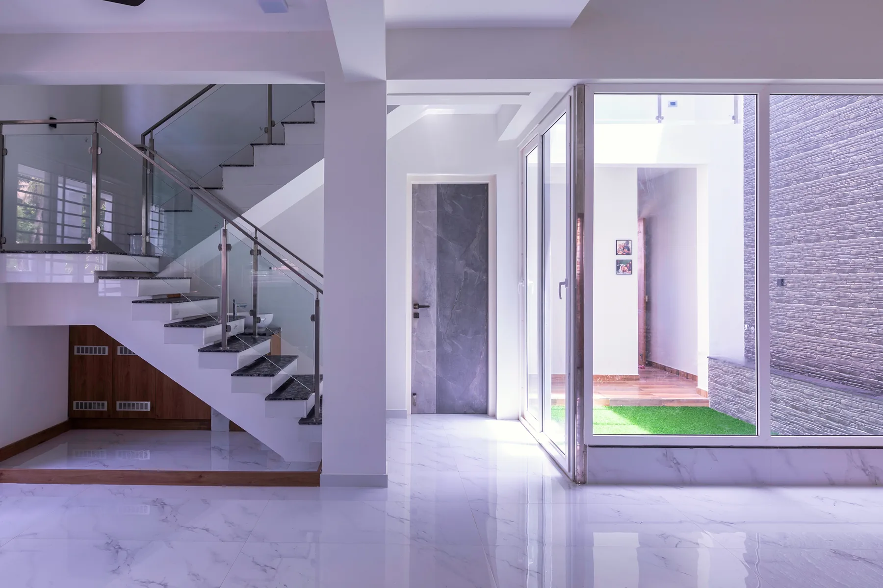 Karthick Residence — staircase overlooking internal courtyard, Guduvanchery, Chennai